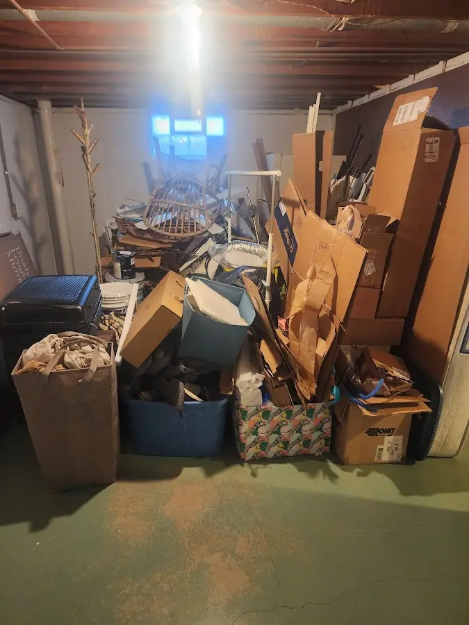 Roll-off dumpster container at job site for Yard Waste Dumpster Rental in Paxton